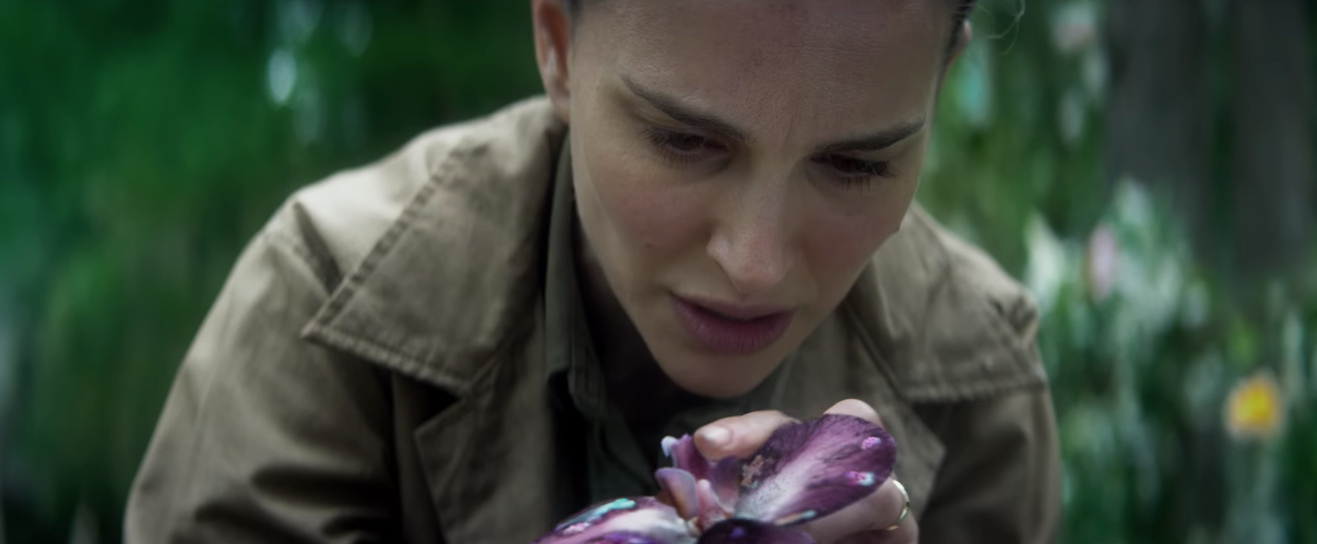 Annihilation Examining a flower inside Area X