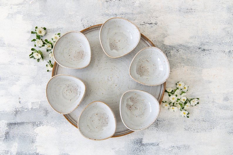 white ceramic seder plate