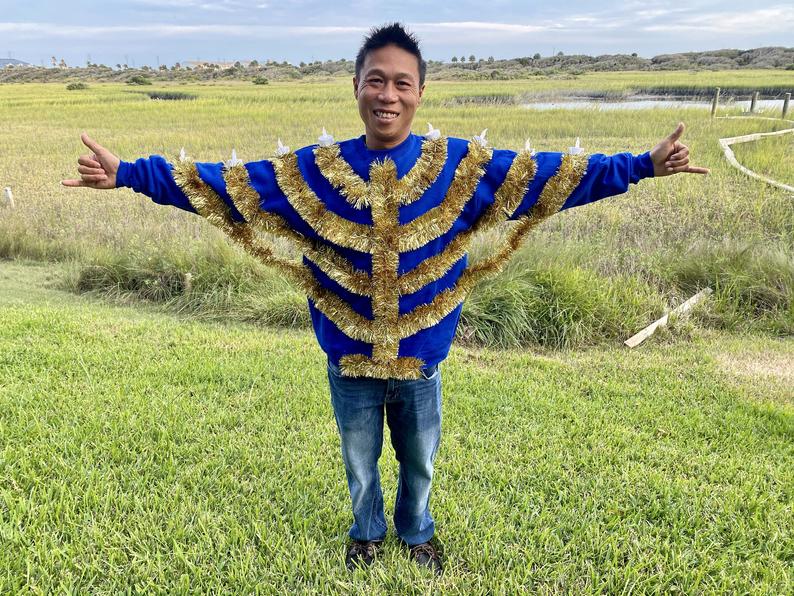 man in light up hanukkah sweater