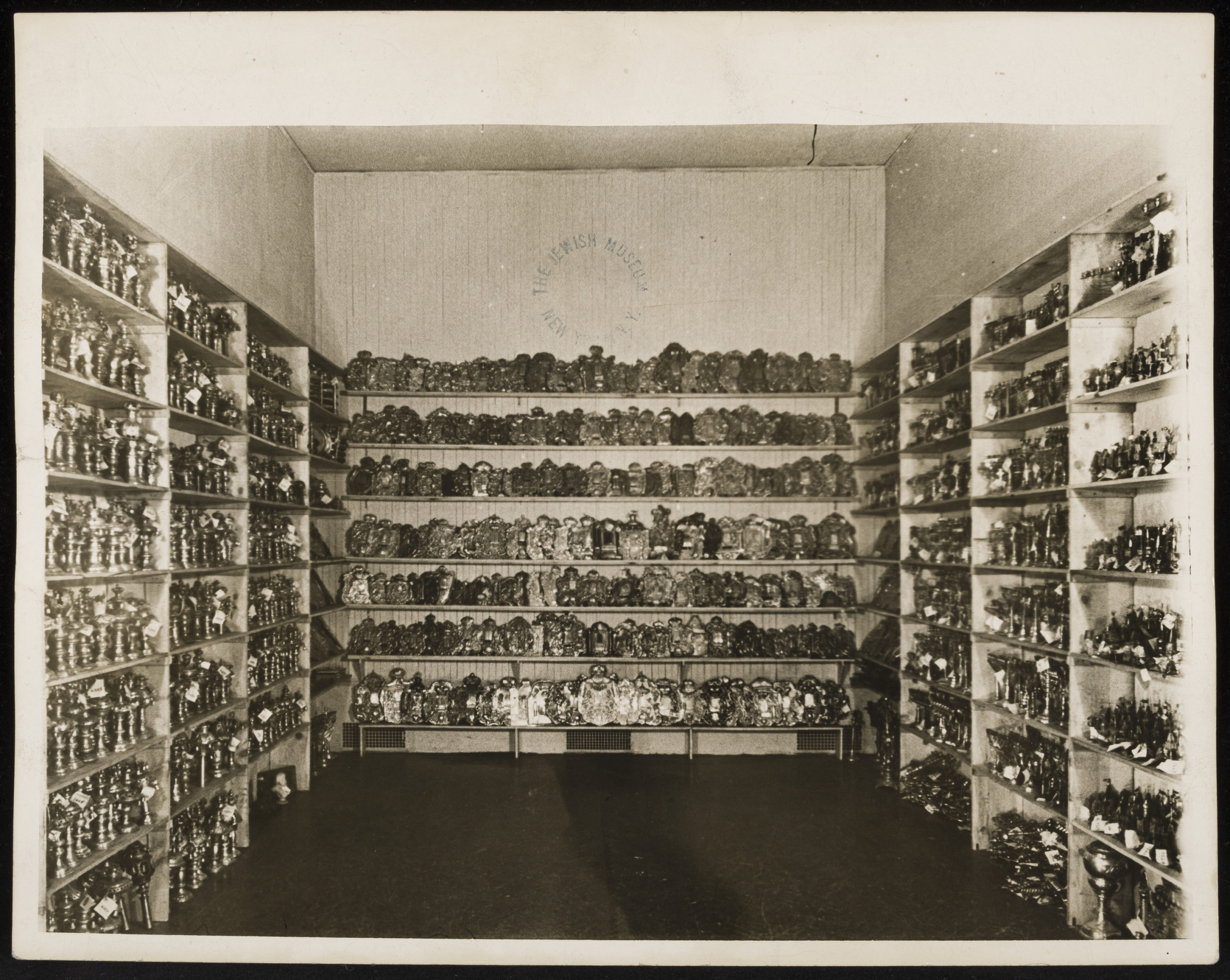 Orphaned ceremonial objects in temporary storage at the Jewish Museum, 1949-Press Image - 3000px W (300dpi)