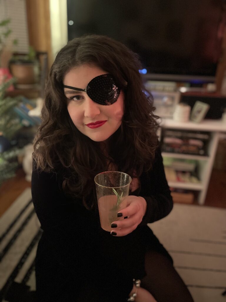 author with an eye patch