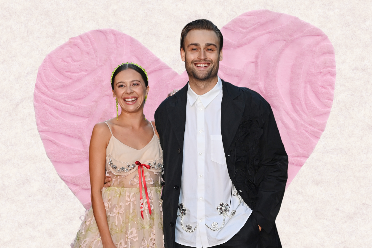 Bel Powley and Douglas Booth with a pink heart in the background