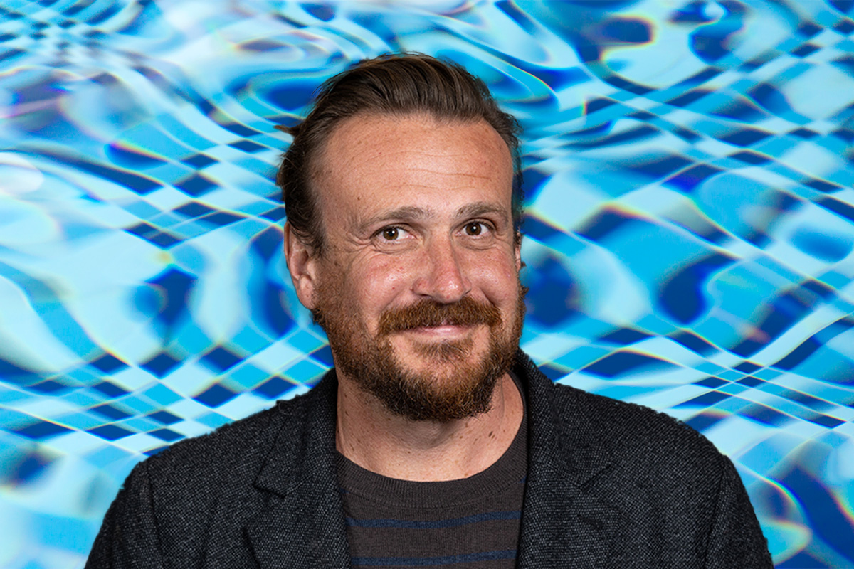 Jason Segel on an abstract blue background