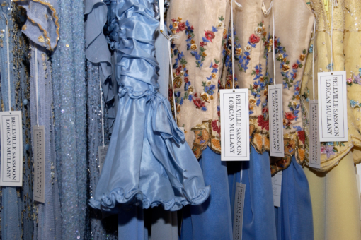 Blue, yellow and floral Evening Dresses Hanging On Racks At Fashion Company Bellville Sassoon In Chelsea