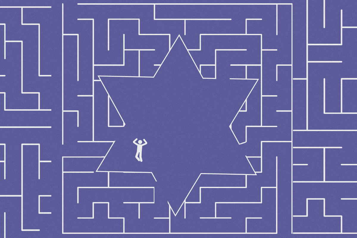 A person in the center of a maze that's shaped like a Star of David. The person looks frustrated.