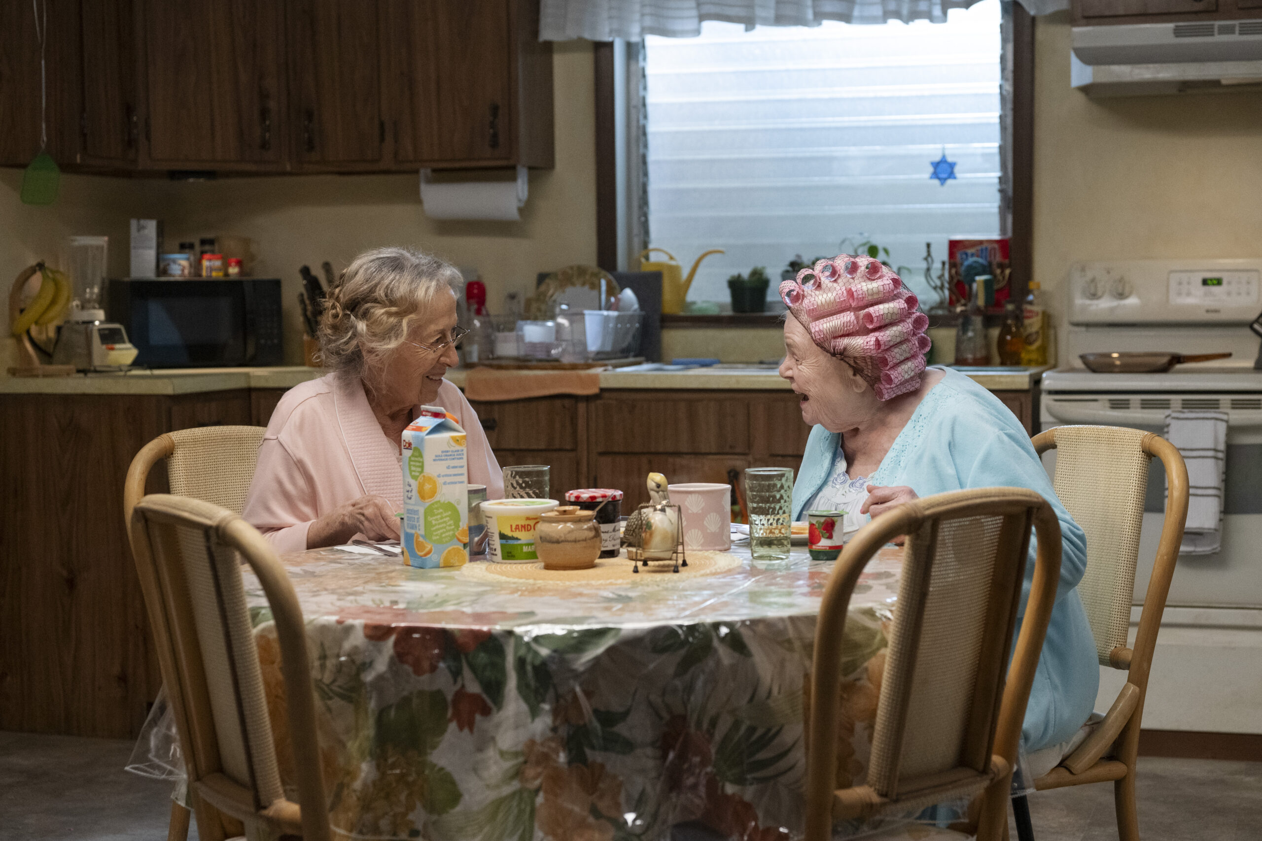 June Squibb and Rita Zohar chat at a breakfast table in "Eleanor the Great."