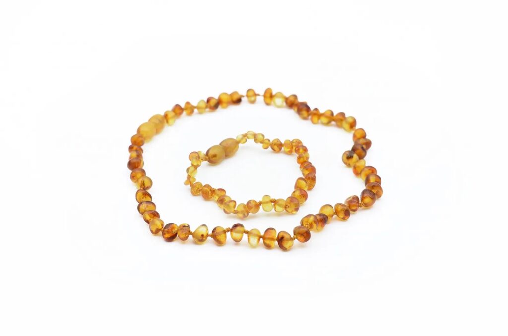 Fossilized Tree Bracelet and Necklace Set by ANAmberBoutique (Etsy)