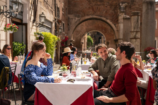 A scene from "Emily in Paris" where Emily and friends dine at a restaurant in the historic Jewish ghetto.