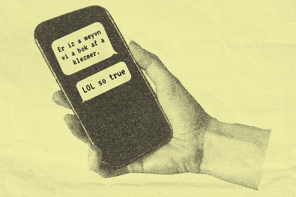 Hand with text messages in Yiddish on yellow background