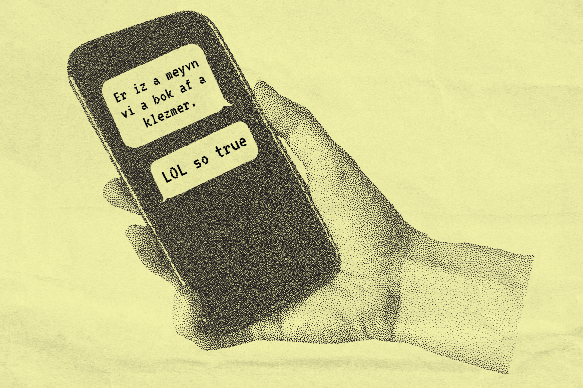 Hand with text messages in Yiddish on yellow background